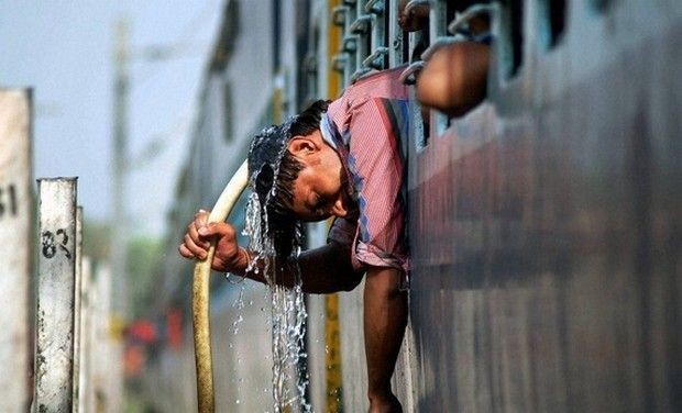 heat wave man washes head with cold water_0_0_0_0_0