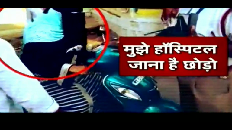 ट्राफिक पुलिस पर दबंगई दिखाती महिला का वीडियो हो रहा है वायरल।